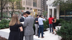 (From far left) Christine Jackson, co chair of the OBA's central executive and Robert Richler, Technology Liaison, chat with Omar Ha-Redeye of Fleet Street Law during the filming of a series of videos on mentorship, while (from far right) Fleet Street Law's Public Relations Intern Katerina Chekurova and Lawyer Rocco Achampong participate in the filming. 